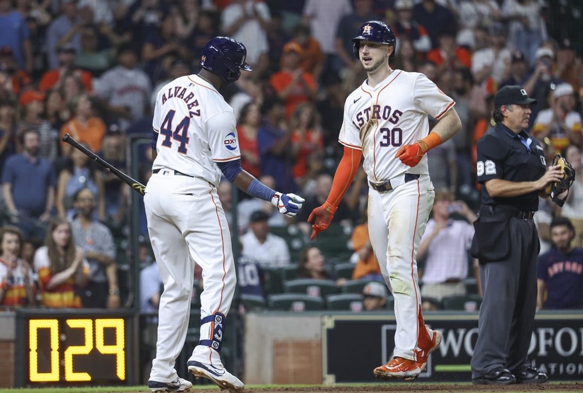 May 21, 2024; Houston, Texas, USA; Houston Astros right fielder Kyle Tucker (30) celebrates with designated hitter Yordan Alvarez (44) after hitting a home run during the seventh inning against the Los Angeles Angels at Minute Maid Park. Mandatory Credit: Troy Taormina-USA TODAY Sports