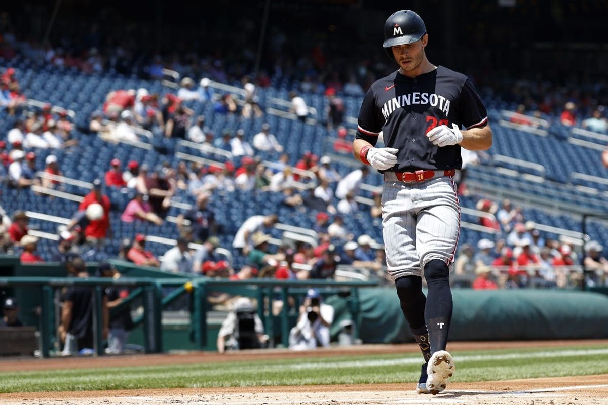 May 22, 2024; Washington, District of Columbia, USA; Minnesota Twins outfielder Max Kepler (26) touches home plate after hitting a home run against the Washington Nationals during the second inning at Nationals Park. Mandatory Credit: Geoff Burke-USA TODAY Sports