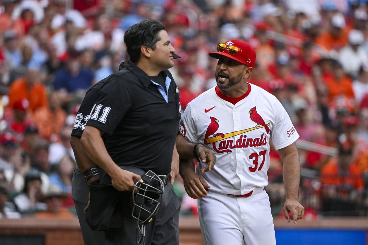 May 22, 2024; St. Louis, Missouri, USA;  St. Louis Cardinals manager Oliver Marmol (37) argues with umpire Charlie Roos (111) after he was ejected during the third inning against the Baltimore Orioles at Busch Stadium. Mandatory Credit: Jeff Curry-USA TODAY Sports