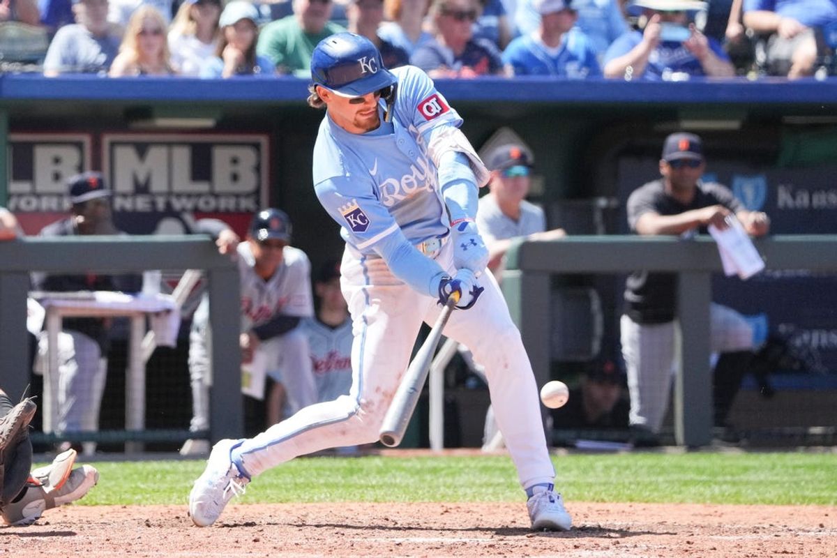 May 22, 2024; Kansas City, Missouri, USA; Kansas City Royals shortstop Bobby Witt Jr. (7) hits a two run double against the Detroit Tigers in the seventh inning at Kauffman Stadium. Mandatory Credit: Denny Medley-USA TODAY Sports