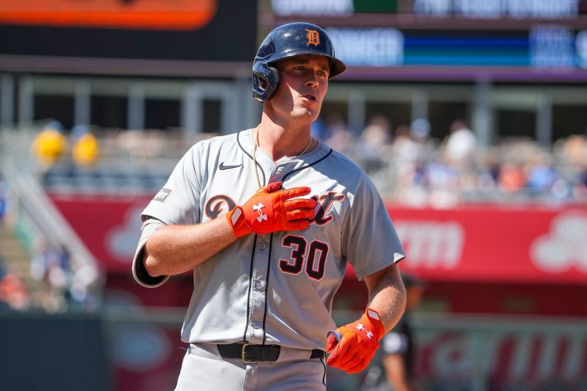 May 22, 2024; Kansas City, Missouri, USA; Detroit Tigers outfielder Kerry Carpenter (30) celebrates after hitting a single against the Kansas City Royals in the ninth inning at Kauffman Stadium. Mandatory Credit: Denny Medley-USA TODAY Sports