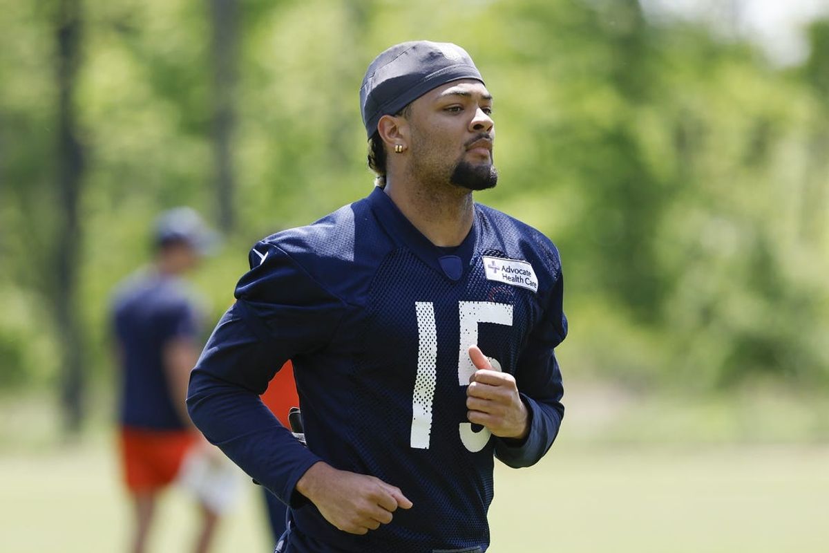May 23, 2024; Lake Forest, IL, USA; Chicago Bears wide receiver Rome Odunze (15) warms up during organized team activities at Halas Hall Mandatory Credit: Kamil Krzaczynski-USA TODAY Sports
