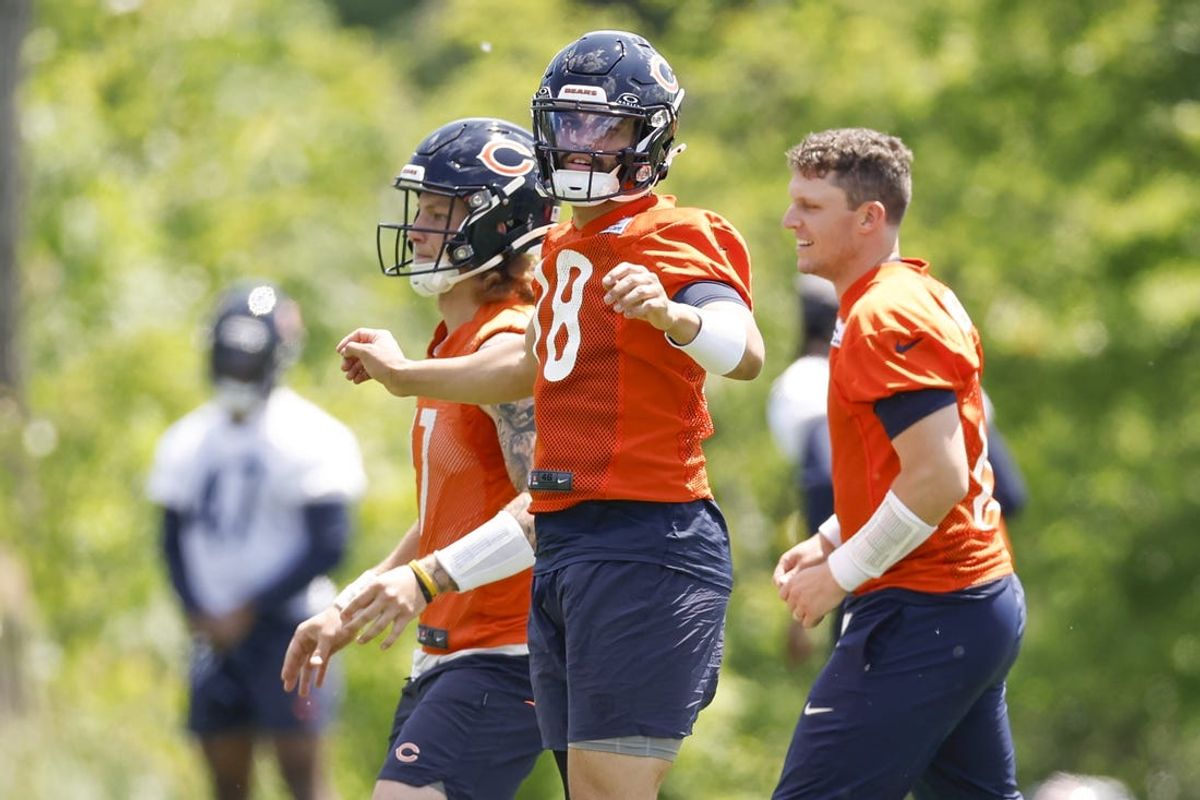 May 23, 2024; Lake Forest, IL, USA; Chicago Bears quarterback Caleb Williams (18) warms up during organized team activities at Halas Hall Mandatory Credit: Kamil Krzaczynski-USA TODAY Sports