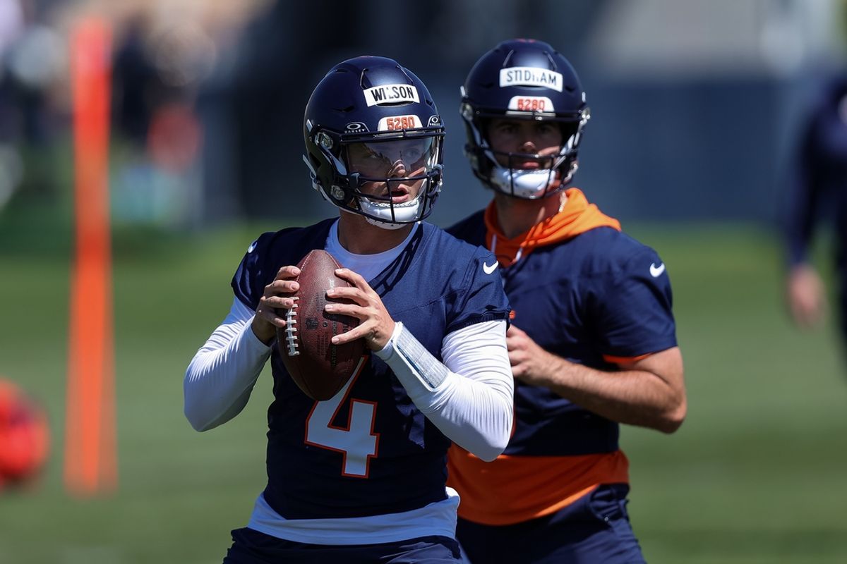 May 23, 2024; Englewood, CO, USA; Denver Broncos quarterback Zach Wilson (4) and quarterback Jarrett Stidham (8) during organized team activities at Centura Health Training Center. Mandatory Credit: Isaiah J. Downing-USA TODAY Sports