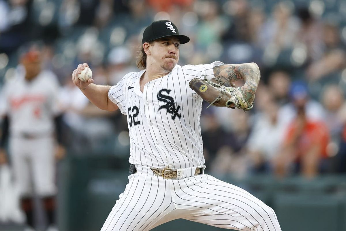 May 23, 2024; Chicago, Illinois, USA; Chicago White Sox starting pitcher Mike Clevinger (52) delivers a pitch against the Baltimore Orioles during the first inning at Guaranteed Rate Field. Mandatory Credit: Kamil Krzaczynski-USA TODAY Sports