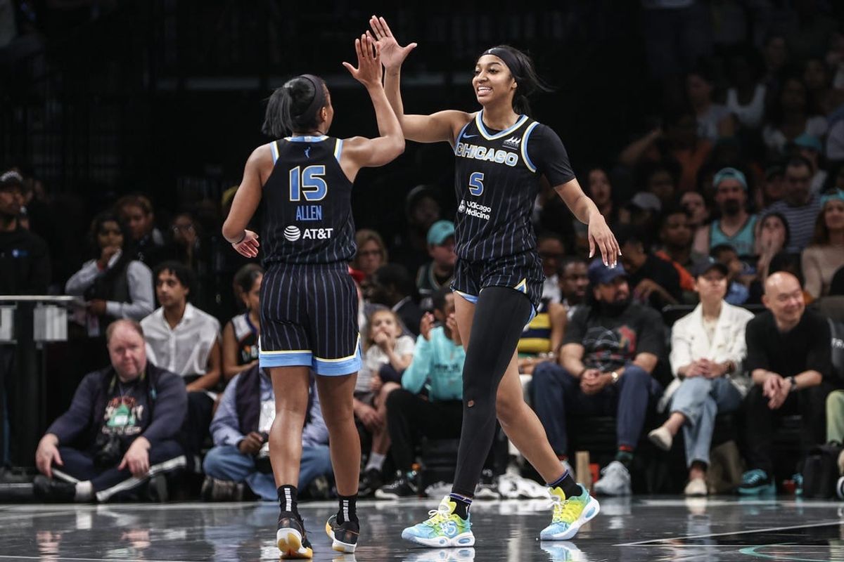 May 23, 2024; Brooklyn, New York, USA;  Chicago Sky forward Angel Reese (5) celebrates with guard Lindsay Allen (15) in the fourth quarter against the New York Liberty at Barclays Center. Mandatory Credit: Wendell Cruz-USA TODAY Sports