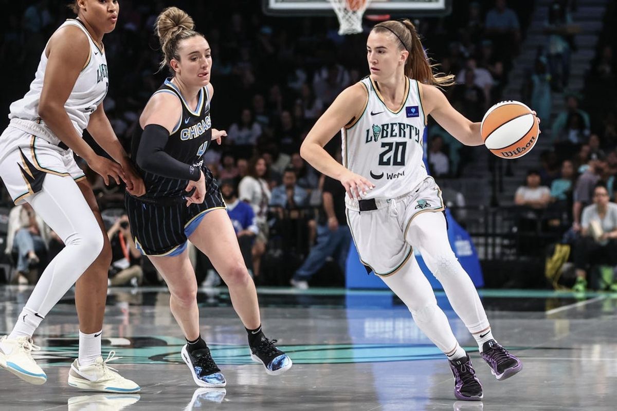 May 23, 2024; Brooklyn, New York, USA;  New York Liberty guard Sabrina Ionescu (20) looks to drive past Chicago Sky guard Marina Mabrey (4) in the first quarter at Barclays Center. Mandatory Credit: Wendell Cruz-USA TODAY Sports