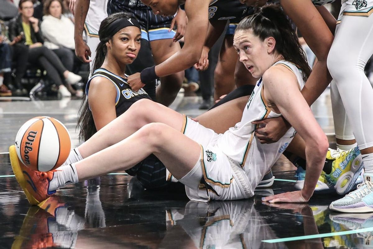 May 23, 2024; Brooklyn, New York, USA;  Chicago Sky forward Angel Reese (5) reacts after being fouled by New York Liberty forward Breanna Stewart (30) in the fourth quarter at Barclays Center. Mandatory Credit: Wendell Cruz-USA TODAY Sports