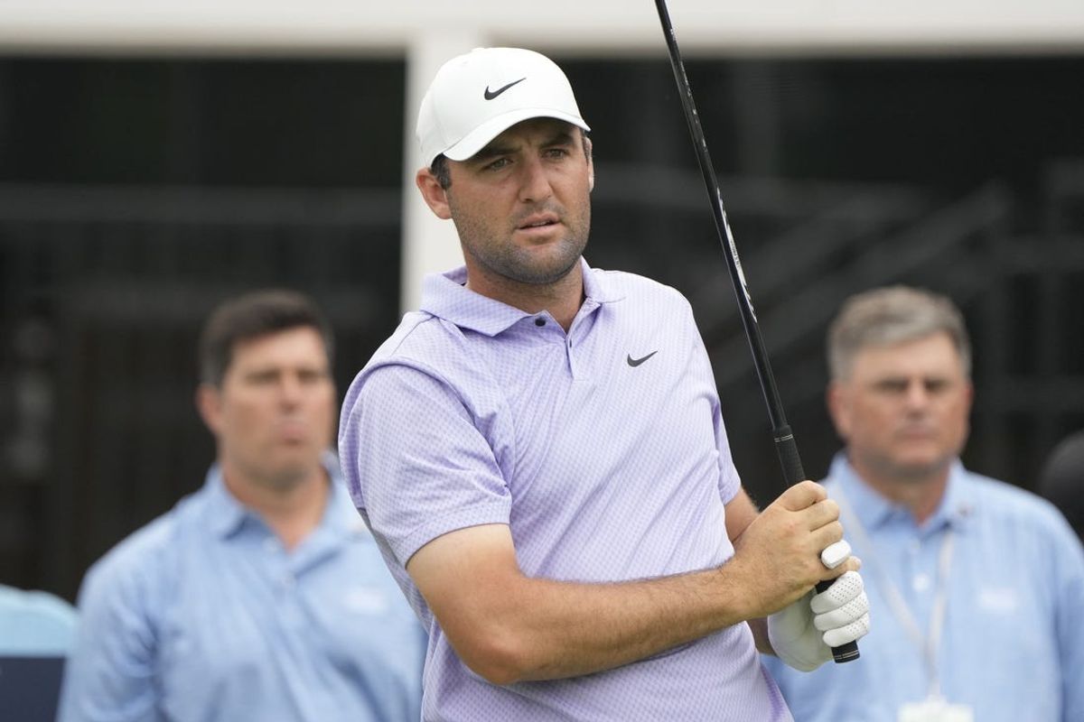 May 24, 2024; Fort Worth, Texas, USA; Scottie Scheffler plays his shot on the seventeenth tee during the second round of the Charles Schwab Challenge golf tournament. Mandatory Credit: Jim Cowsert-USA TODAY Sports