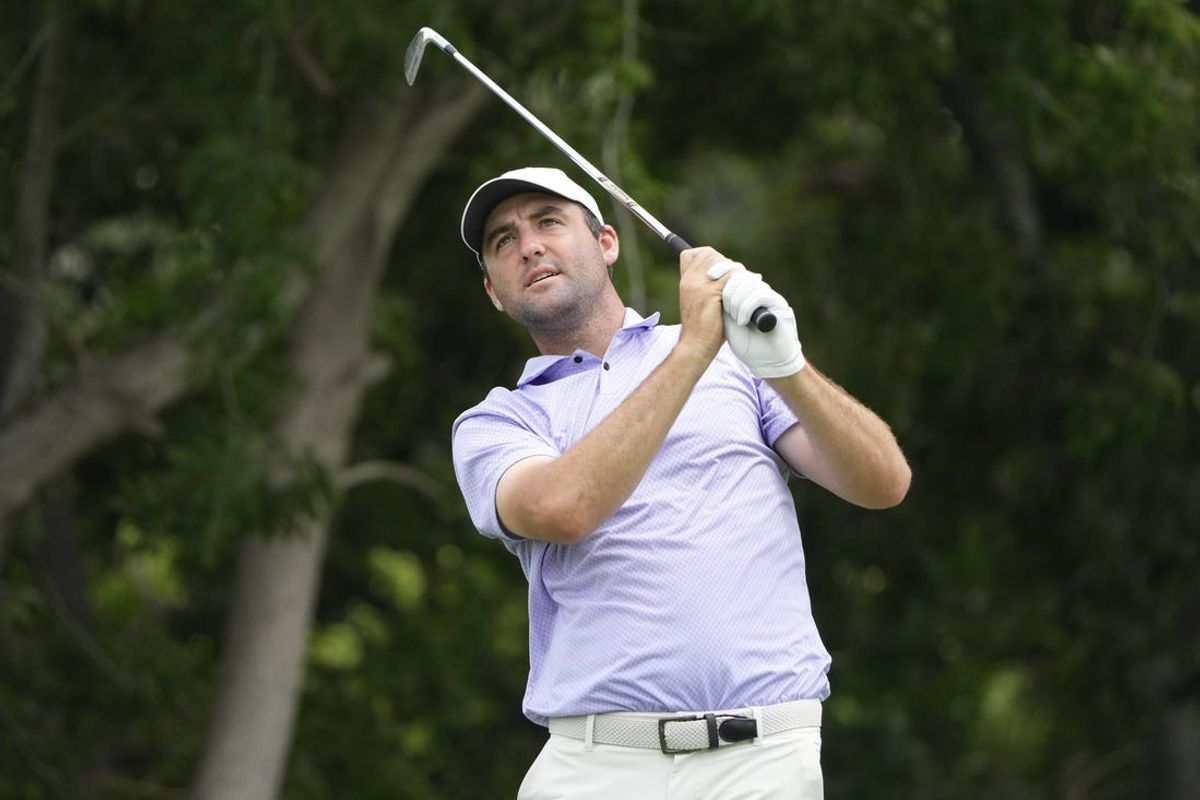 May 24, 2024; Fort Worth, Texas, USA; Scottie Scheffler plays his shot from the eighth tee during the second round of the Charles Schwab Challenge golf tournament. Mandatory Credit: Jim Cowsert-USA TODAY Sports