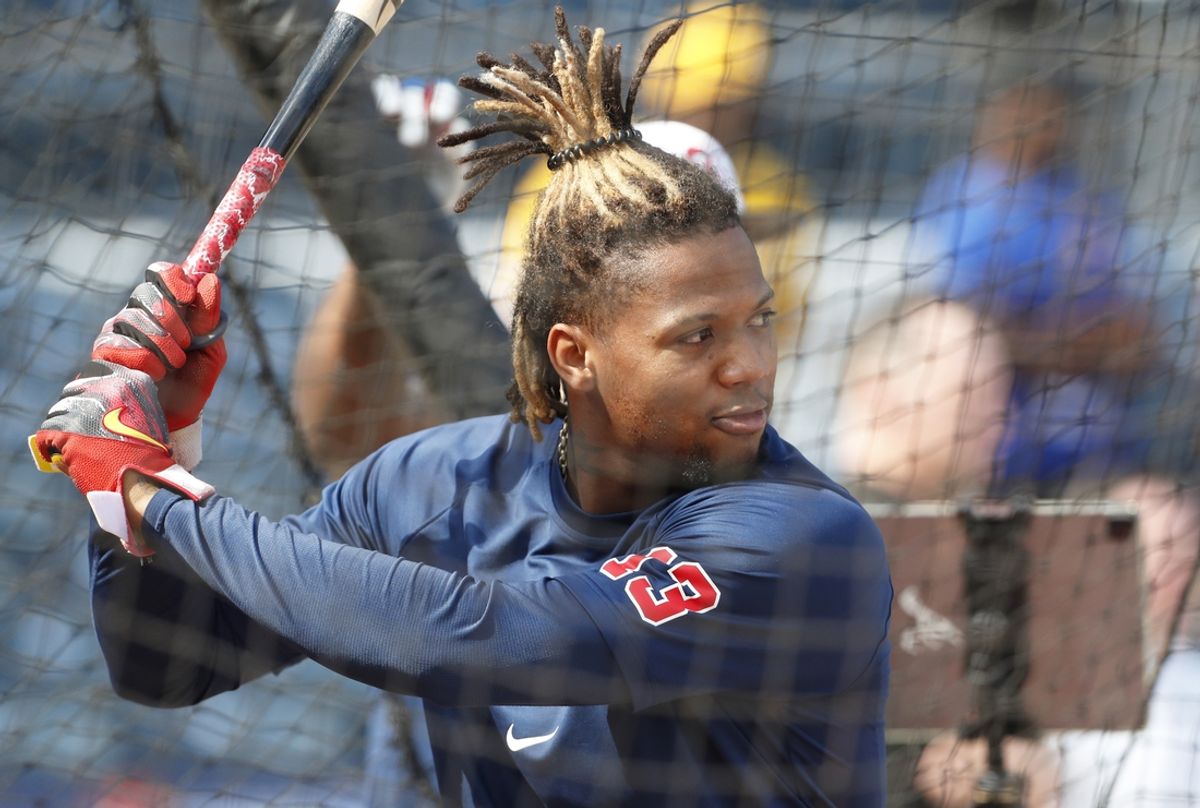 May 24, 2024; Pittsburgh, Pennsylvania, USA;  Atlanta Braves right fielder Ronald Acuna Jr. (13) in the batting cage before the game against the Pittsburgh Pirates at PNC Park. Mandatory Credit: Charles LeClaire-Imagn Images