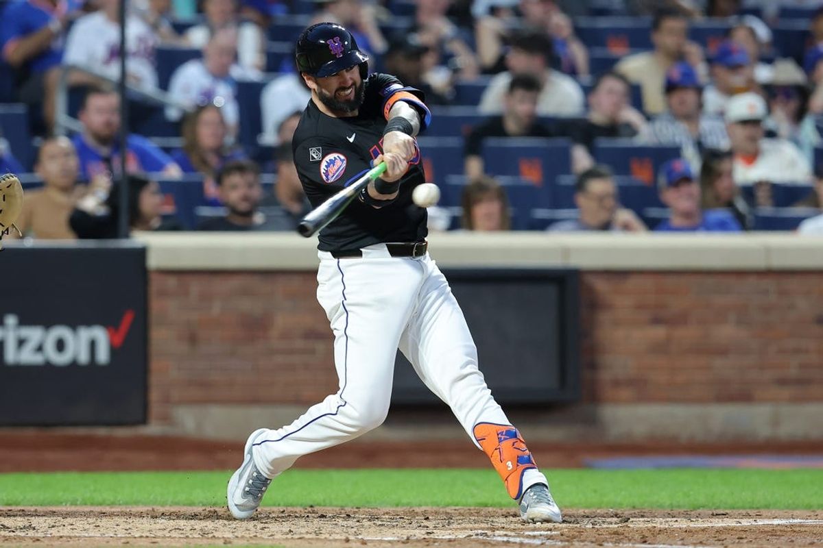 May 24, 2024; New York City, New York, USA; New York Mets catcher Tomas Nido (3) hits an RBI sacrifice fly during the fourth inning against the San Francisco Giants at Citi Field. Mandatory Credit: Brad Penner-USA TODAY Sports