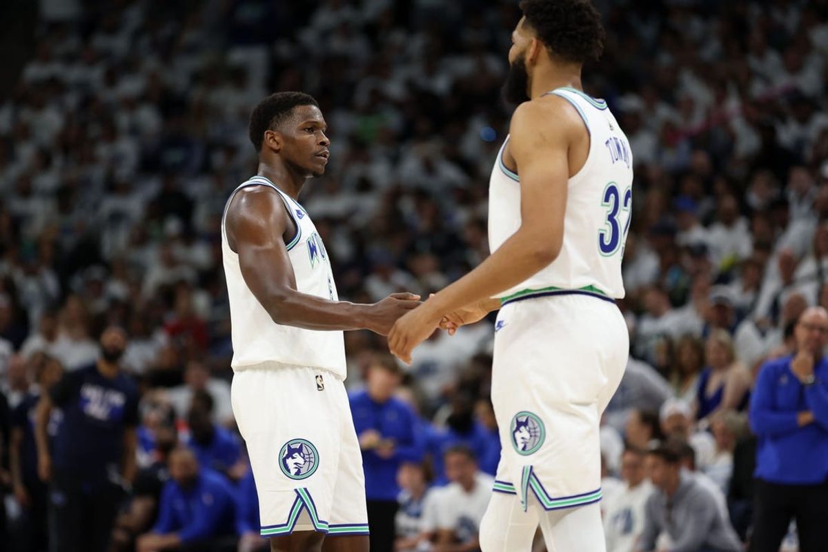 Minnesota Timberwolves guard Anthony Edwards and center Karl-Anthony Towns vow to get back to the Western Conference finals next year. Mandatory Credit: Jesse Johnson-USA TODAY Sports