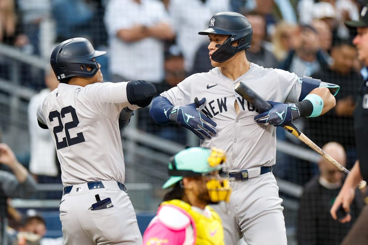 May 24, 2024; San Diego, California, USA;  New York Yankees right fielder Juan Soto (22) celebrates with New York Yankees center fielder Aaron Judge (99) after hitting a two-run home run in the third inning against the San Diego Padres at Petco Park. Mandatory Credit: David Frerker-USA TODAY Sports