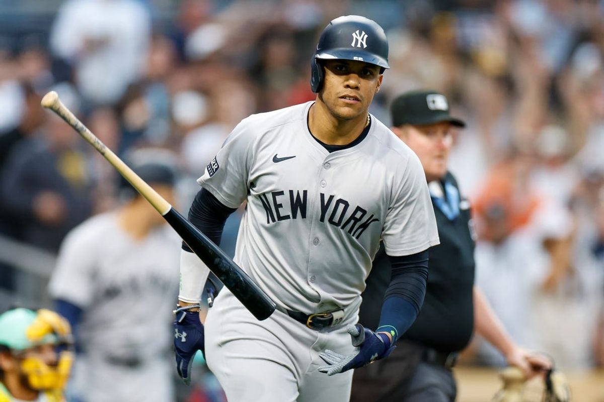 May 24, 2024; San Diego, California, USA; New York Yankees right fielder Juan Soto (22) flips his bat after hitting a two-run home run in the third inning against the San Diego Padres at Petco Park. Mandatory Credit: David Frerker-USA TODAY Sports