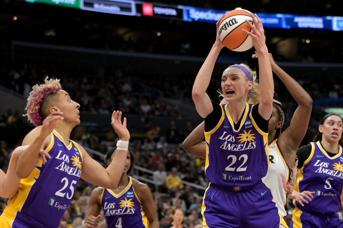 May 24, 2024; Los Angeles, California, USA;  Los Angeles Sparks guard Layshia Clarendon (25) looks on as Los Angeles Sparks forward Cameron Brink (22) grabs a rebound in the first half against the Indiana Fever at Crypto.com Arena. Mandatory Credit: Jayne Kamin-Oncea-USA TODAY Sports