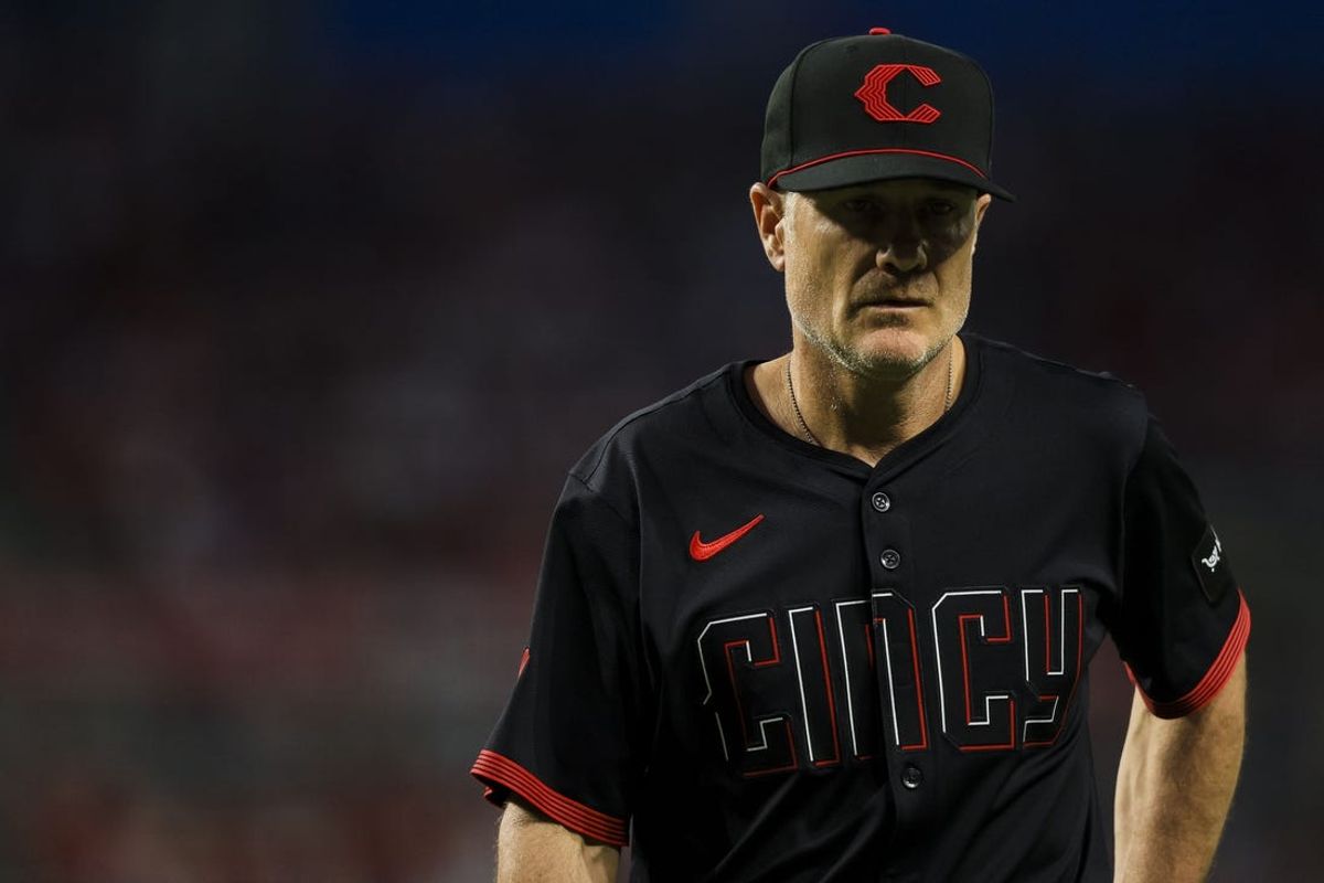 May 24, 2024; Cincinnati, Ohio, USA; Cincinnati Reds manager David Bell (25) walks off the field during a pitching change in the sixth inning against the Los Angeles Dodgers at Great American Ball Park. Mandatory Credit: Katie Stratman-USA TODAY Sports