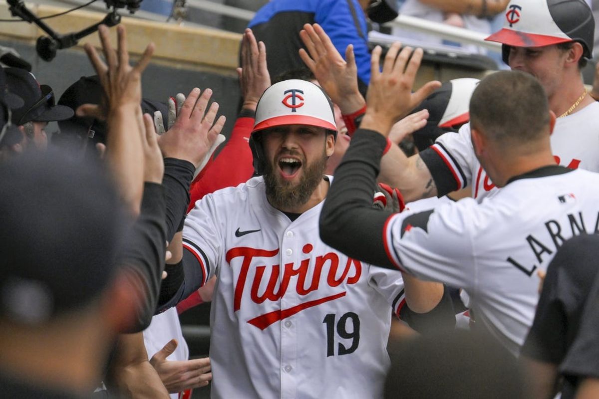 May 25, 2024; Minneapolis, Minnesota, USA;  Minnesota Twins designated hitter Alex Kirilloff (19) celebrates his three-run home run against the Texas Rangers during the eighth inning at Target Field. Mandatory Credit: Nick Wosika-USA TODAY Sports