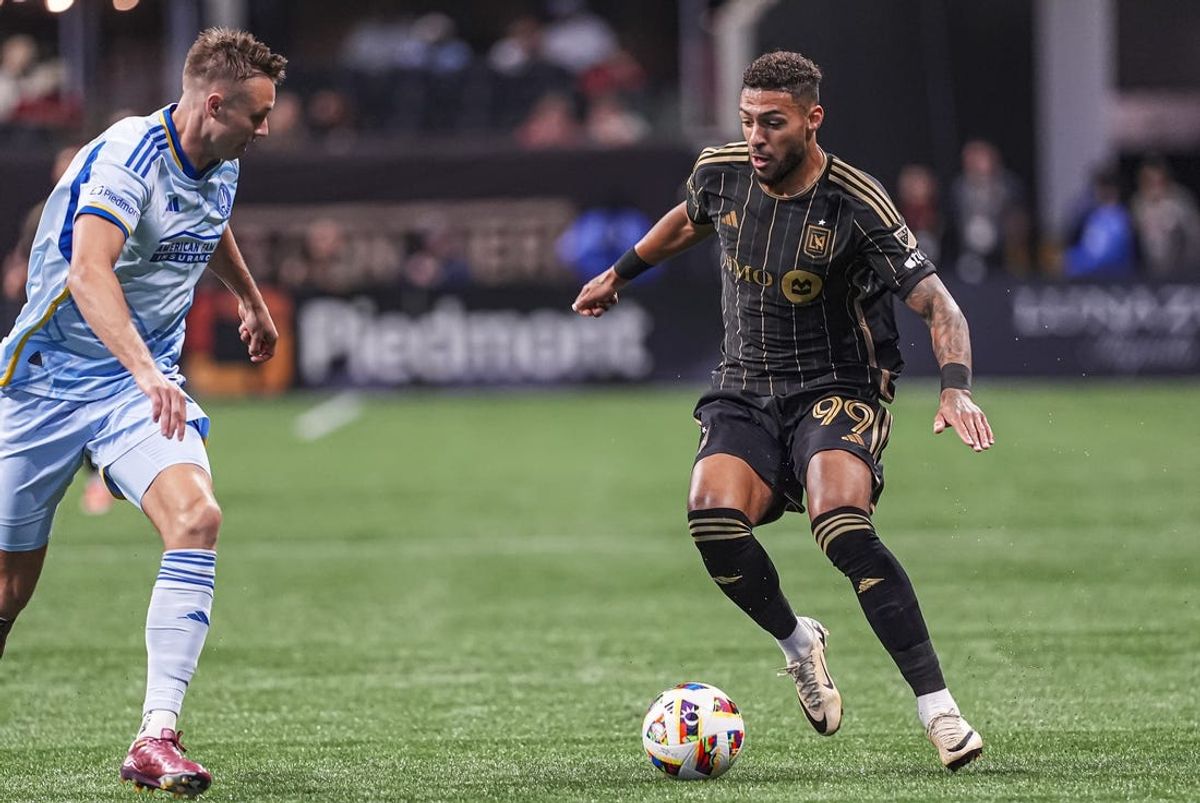 May 25, 2024; Atlanta, Georgia, USA; Los Angeles FC forward Denis Bouanga (99) controls the ball against Atlanta United defender Stian Gregersen (5) during the first half at Mercedes-Benz Stadium. Mandatory Credit: Dale Zanine-USA TODAY Sports