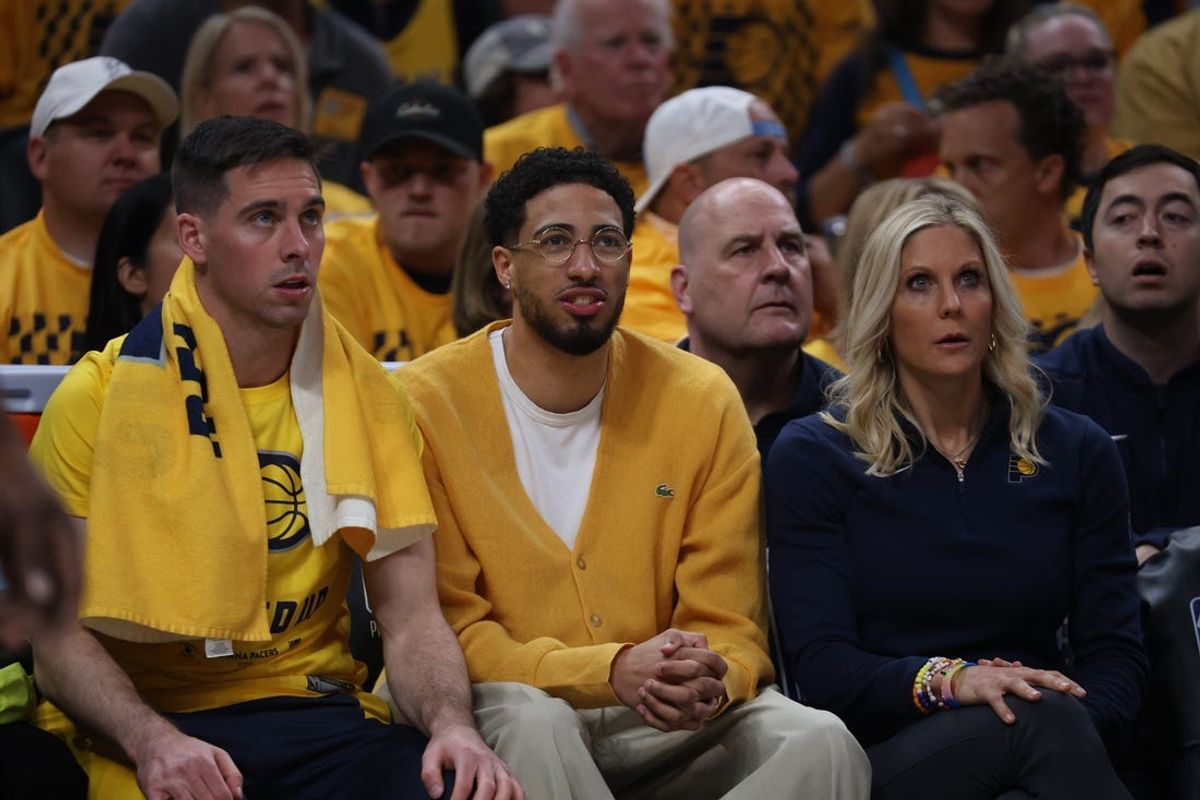 May 25, 2024; Indianapolis, Indiana, USA; Indiana Pacers guard Tyrese Haliburton (middle) looks on from the bench during the first quarter of game three of the eastern conference finals against the Boston Celtics  in the 2024 NBA playoffs at Gainbridge Fieldhouse. Mandatory Credit: Trevor Ruszkowski-USA TODAY Sports