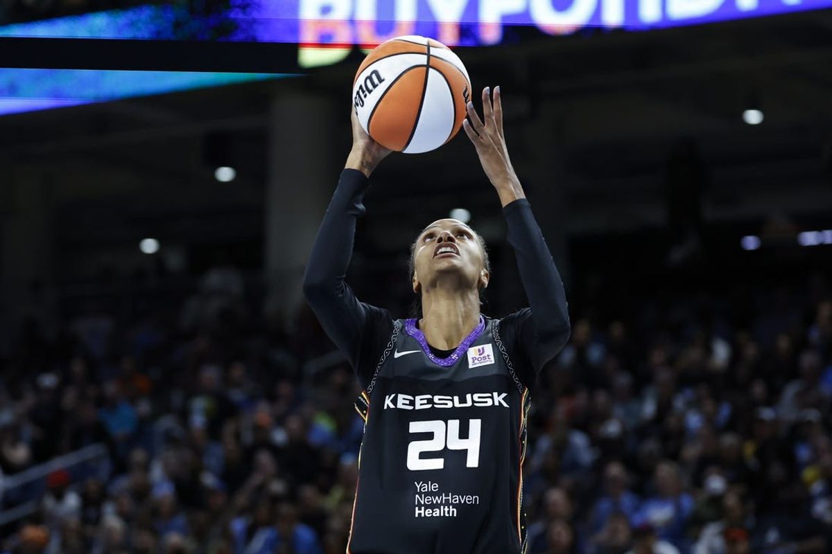 May 25, 2024; Chicago, Illinois, USA; Connecticut Sun forward DeWanna Bonner (24) goes to the basket against the Chicago Sky during the first half of a WNBA game at Wintrust Arena. Mandatory Credit: Kamil Krzaczynski-USA TODAY Sports