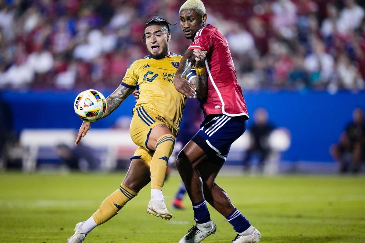May 25, 2024; Frisco, Texas, USA; Real Salt Lake forward Cristian Arango (9) and FC Dallas defender Nkosi Tafari (17) battle for the ball during the second half at Toyota Stadium. Mandatory Credit: Chris Jones-USA TODAY Sports