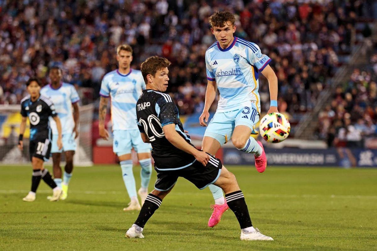 May 25, 2024; Commerce City, Colorado, USA; Minnesota United forward Wil Trapp (20) and Colorado Rapids defender Sam Vines (3) go for the ball during the first half at Dick's Sporting Goods Park. Mandatory Credit: Andrew Wevers-USA TODAY Sports