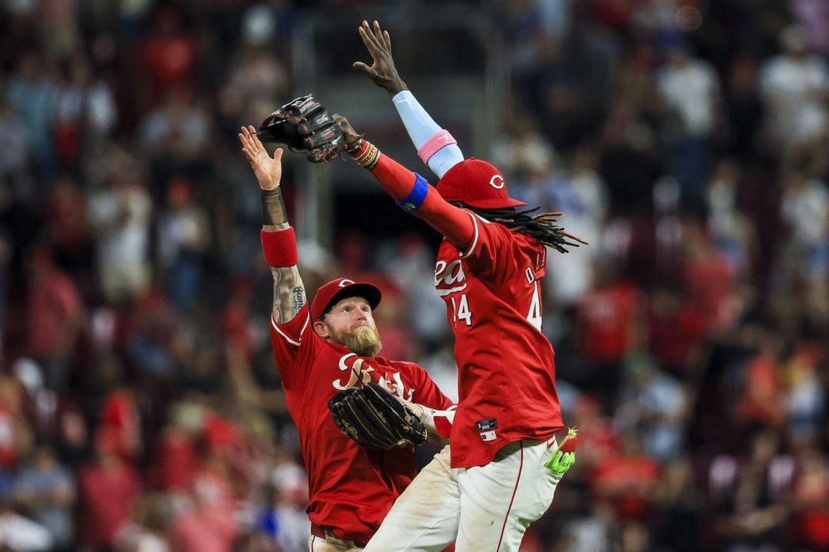 May 25, 2024; Cincinnati, Ohio, USA; Cincinnati Reds outfielder Jake Fraley (27) high fives shortstop Elly De La Cruz (44) after the victory over the Los Angeles Dodgers at Great American Ball Park. Mandatory Credit: Katie Stratman-USA TODAY Sports