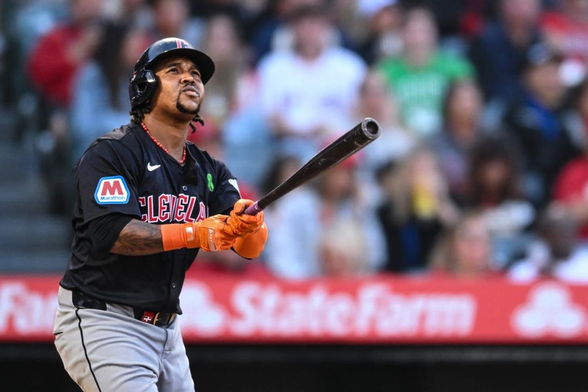 May 25, 2024; Anaheim, California, USA; Cleveland Guardians third baseman Jose Ramirez (11) hits a two-run home run against the Los Angeles Angels during the third inning at Angel Stadium. Mandatory Credit: Jonathan Hui-USA TODAY Sports