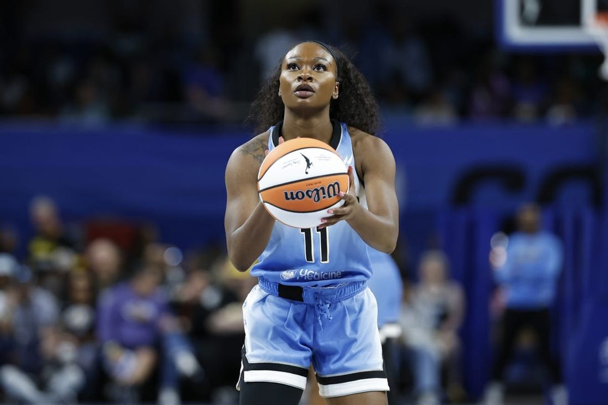 May 25, 2024; Chicago, Illinois, USA; Chicago Sky guard Dana Evans (11) shoots a free throw against the Connecticut Sun during the second half of a WNBA game at Wintrust Arena. Mandatory Credit: Kamil Krzaczynski-USA TODAY Sports