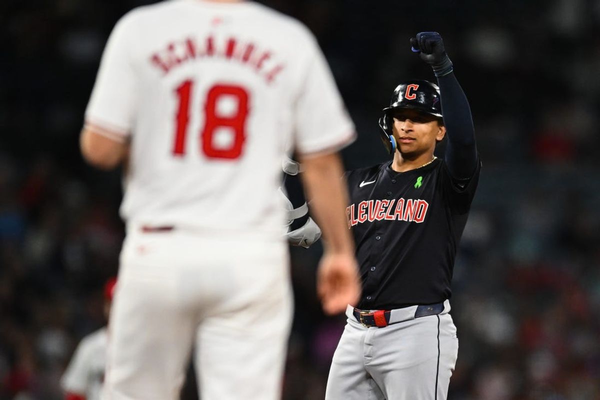 May 25, 2024; Anaheim, California, USA; Cleveland Guardians catcher Bo Naylor (23) reacts after hitting a double against the Los Angeles Angels during the seventh inning at Angel Stadium. Mandatory Credit: Jonathan Hui-USA TODAY Sports