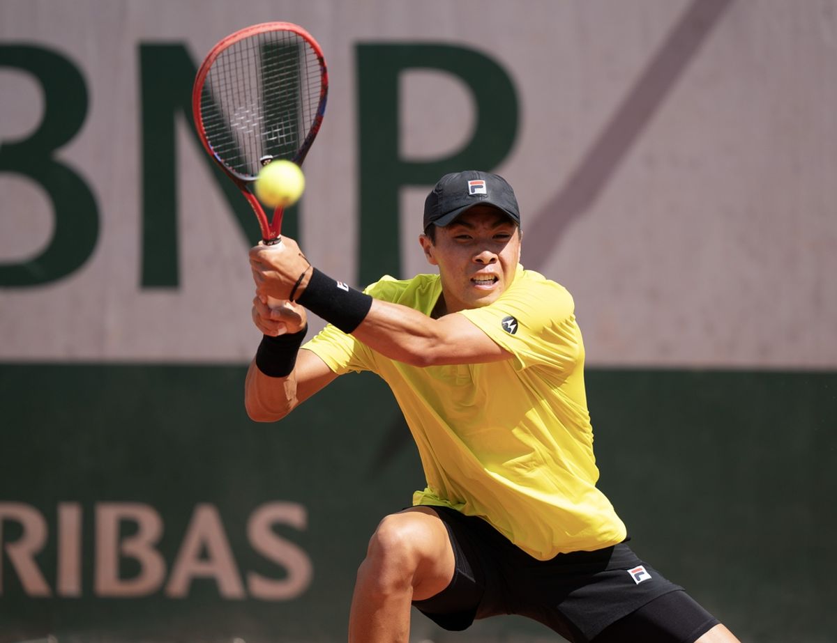 May 26, 2024; Paris, France; Brandon Nakashima of the United States returns a shot in his first round match against Nicolas Moreno De Alboran of the United States on day one of Roland Garros at Stade Roland Garros. Mandatory Credit: Susan Mullane-USA TODAY Sports