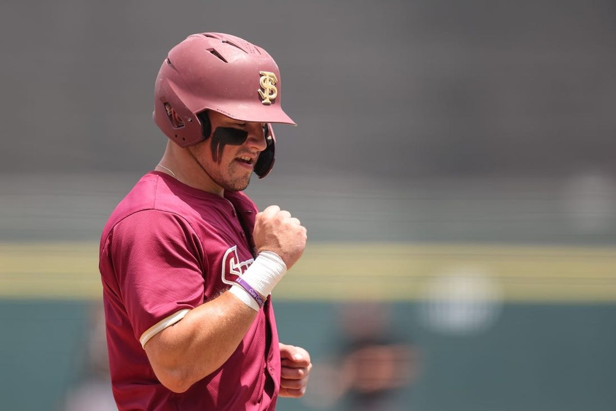 May 25, 2024; Charlotte, NC, USA; Florida State outfielder Jaime Ferrer (7) reacts after scoring a run in the second inning against Wake Forest during the ACC Baseball Tournament at Truist Field. Mandatory Credit: Cory Knowlton-USA TODAY Sports