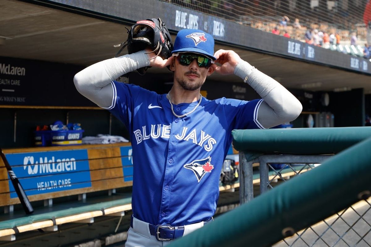 May 26, 2024; Detroit, Michigan, USA; Toronto Blue Jays second baseman Cavan Biggio (8) takes the field prior to the game against the Detroit Tigers at Comerica Park. Mandatory Credit: Brian Bradshaw Sevald-USA TODAY Sports