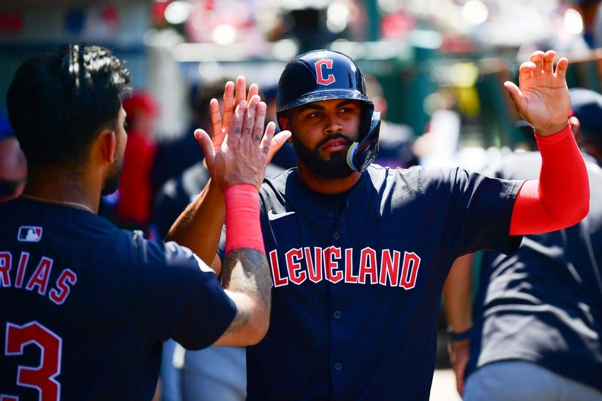 May 26, 2024; Anaheim, California, USA; Cleveland Guardians outfielder Johnathan Rodriguez (30) is greeted after scoring a run against the Los Angeles Angels during the sixth inning at Angel Stadium. Mandatory Credit: Gary A. Vasquez-USA TODAY Sports