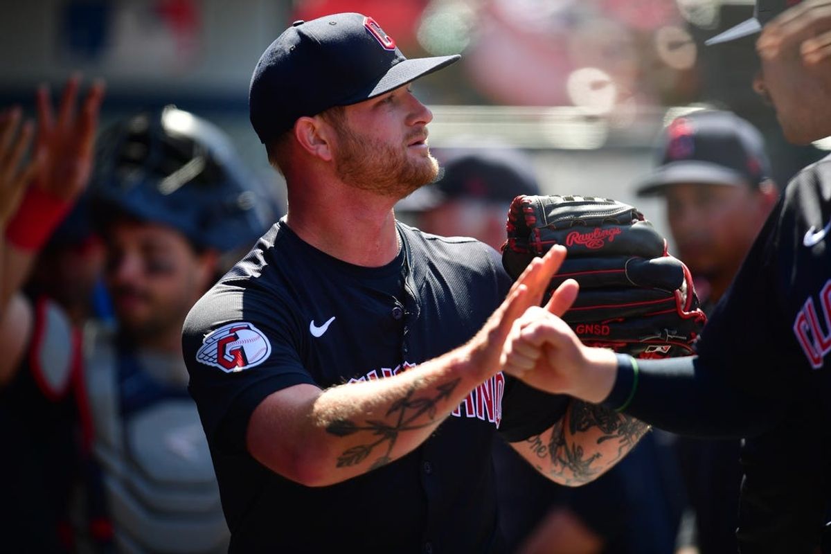 May 26, 2024; Anaheim, California, USA; Cleveland Guardians pitcher Ben Lively (39) is greeted after the seventh inning against the Los Angeles Angels at Angel Stadium. Mandatory Credit: Gary A. Vasquez-USA TODAY Sports