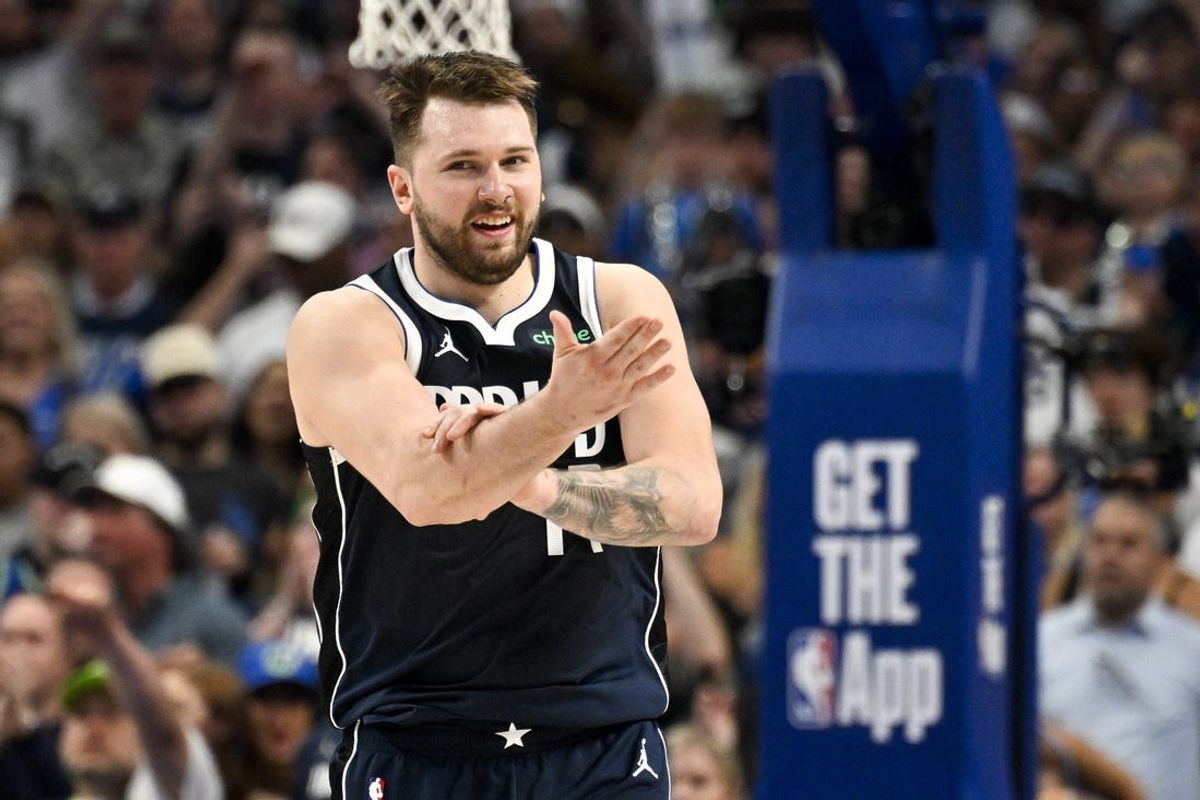 May 26, 2024; Dallas, Texas, USA; Dallas Mavericks guard Luka Doncic (77) reacts to being fouled against the Minnesota Timberwolves during the second half in game three of the western conference finals for the 2024 NBA playoffs at American Airlines Center. Mandatory Credit: Jerome Miron-USA TODAY Sports
