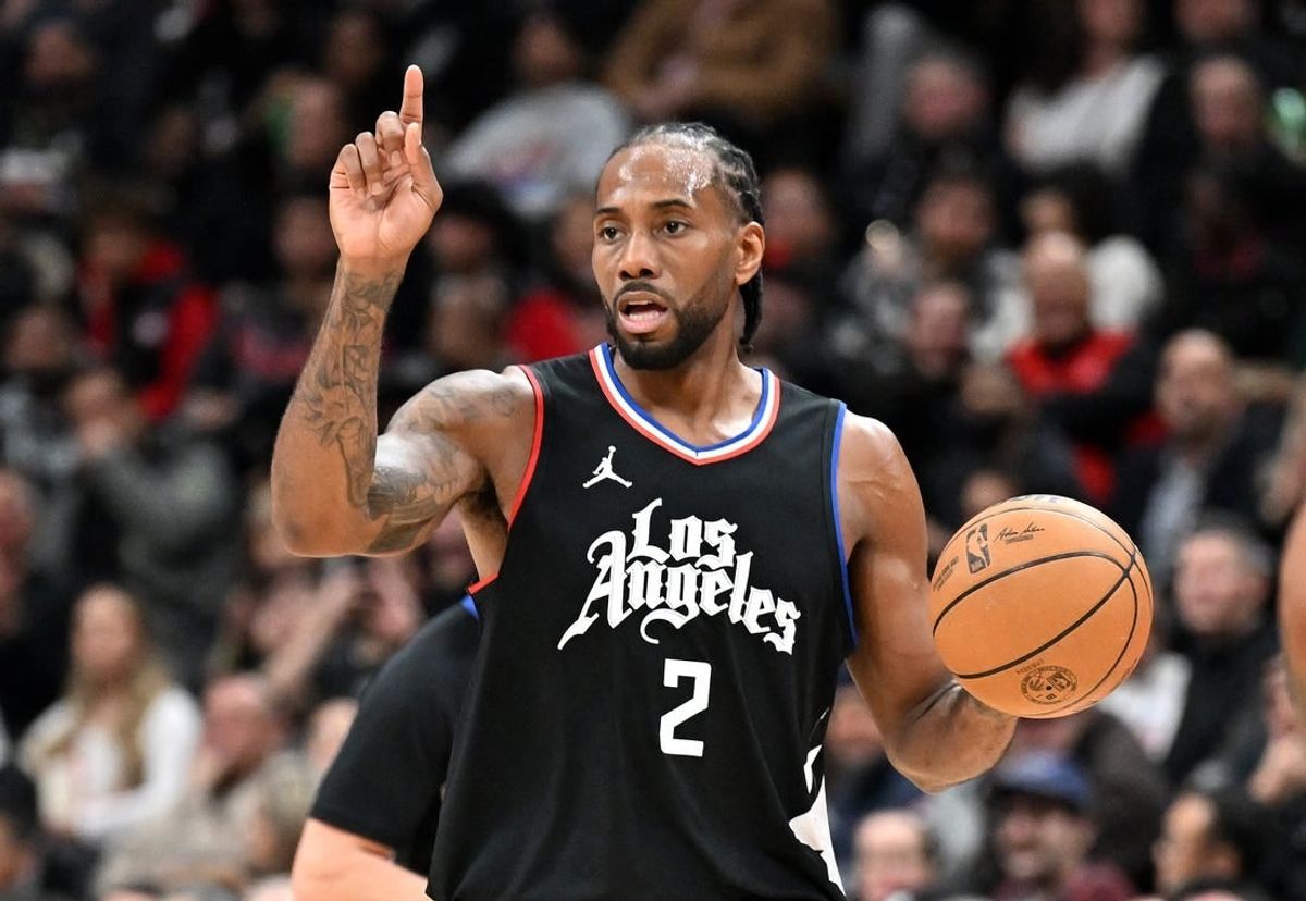 Jan 26, 2024; Toronto, Ontario, CAN;   Los Angeles Clippers forward Kawhi Leonard (2) controls the ball against the Toronto Raptors in the second half at Scotiabank Arena.