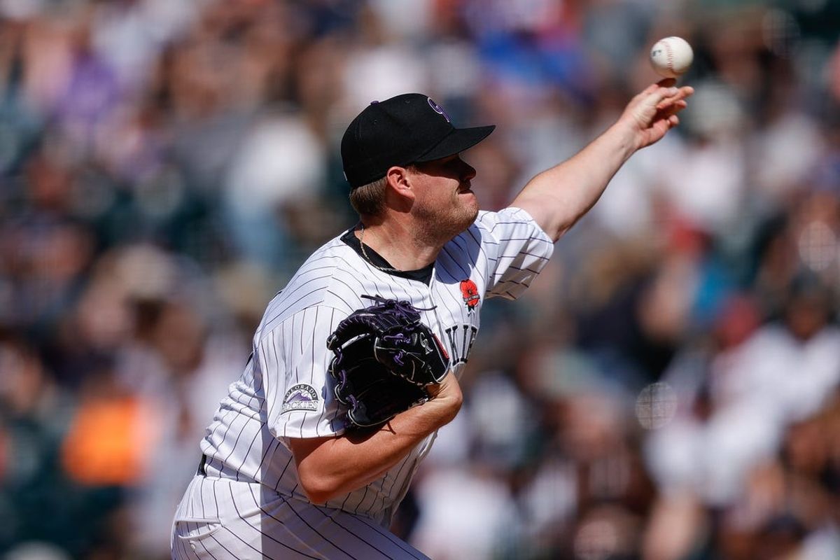 May 27, 2024; Denver, Colorado, USA; Colorado Rockies relief pitcher Josh Rogers (60) pitches in the sixth inning against the Cleveland Guardians at Coors Field. Mandatory Credit: Isaiah J. Downing-USA TODAY Sports