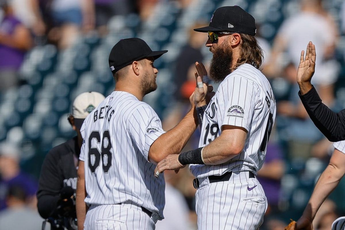 May 27, 2024; Denver, Colorado, USA; Colorado Rockies right fielder Charlie Blackmon (19) celebrates with relief pitcher Jalen Beeks (68) after the game against the Cleveland Guardians at Coors Field. Mandatory Credit: Isaiah J. Downing-USA TODAY Sports