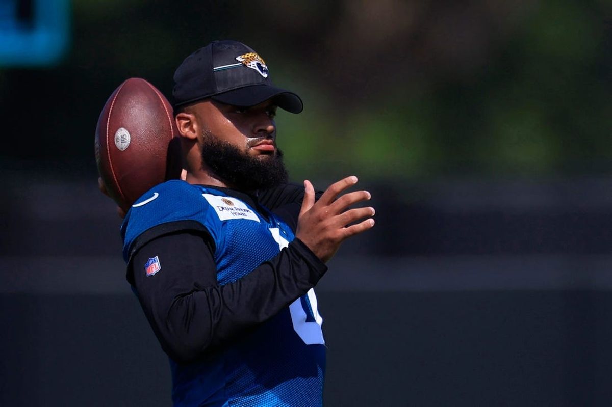 Jacksonville Jaguars wide receiver Gabe Davis (0) throws the ball during an organized team activity Tuesday, May 28, 2024 at EverBank Stadium’s Miller Electric Center in Jacksonville, Fla.