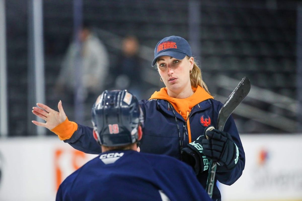 Coachella Valley Firebirds assistant coach Jessica Campbell talks to Firebirds forward Cameron Hughes (19) during practice at Acrisure Arena in Palm Desert, Calif., on Tuesday, May 28, 2024.