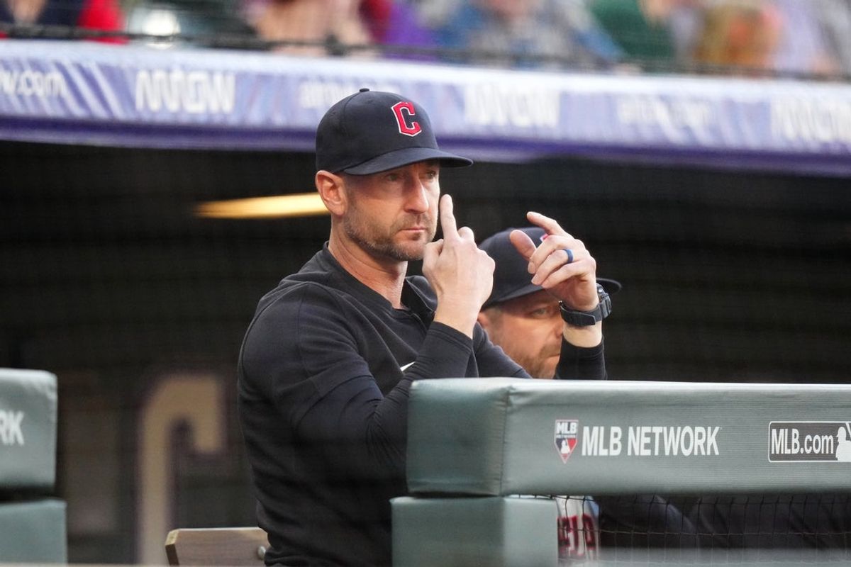 May 28, 2024; Denver, Colorado, USA; Cleveland Guardians bench coach Craig Albernaz (55) calls in a play in the first inning against the Colorado Rockies at Coors Field. Mandatory Credit: Ron Chenoy-Imagn Images