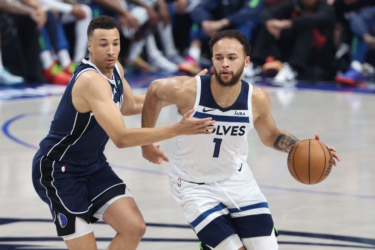 May 28, 2024; Dallas, Texas, USA; Minnesota Timberwolves forward Kyle Anderson (1) dribbles against Dallas Mavericks guard Dante Exum (0) during the second quarter of game four of the western conference finals for the 2024 NBA playoffs at American Airlines Center. Mandatory Credit: Kevin Jairaj-USA TODAY Sports