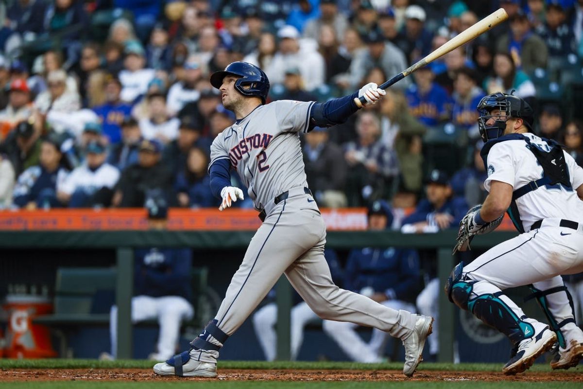 May 28, 2024; Seattle, Washington, USA; Houston Astros third baseman Alex Bregman (2) hits a two-run home run against the Seattle Mariners during the fourth inning at T-Mobile Park. Mandatory Credit: Joe Nicholson-USA TODAY Sports
