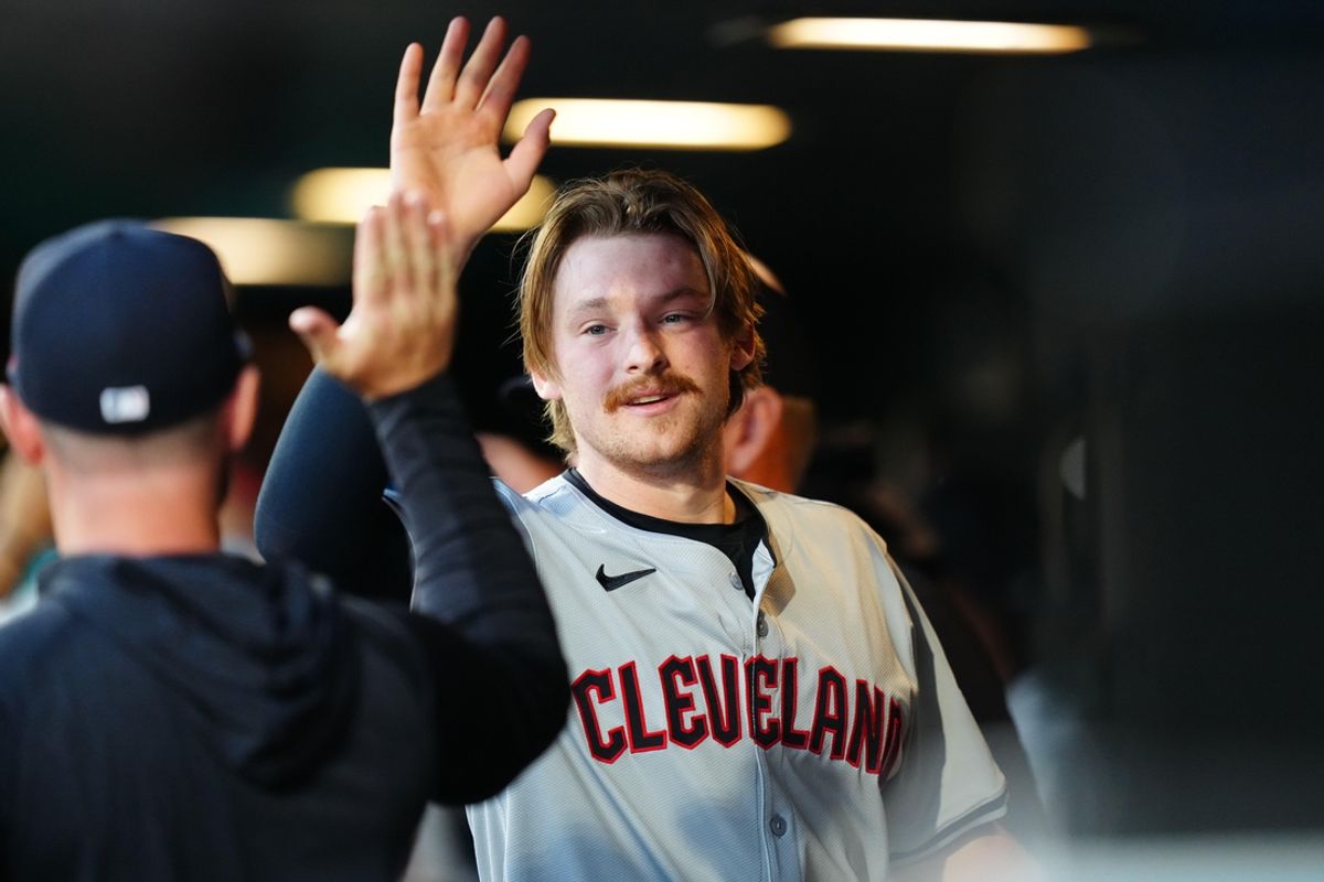 May 28, 2024; Denver, Colorado, USA; Cleveland Guardians designated hitter Kyle Manzardo (9) celebrates his scoring a run in the fourth inning against the Colorado Rockies at Coors Field. Mandatory Credit: Ron Chenoy-Imagn Images