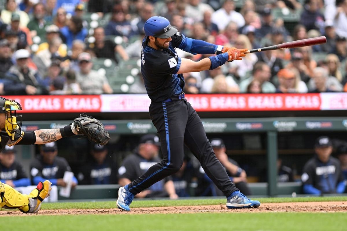 May 29, 2024; Detroit, Michigan, USA;  Detroit Tigers center fielder Matt Vierling (8) hits a three run home run off Pittsburgh Pirates pitcher Jared Jones (37) (not pictured) in the fifth inning at Comerica Park. Mandatory Credit: Lon Horwedel-USA TODAY Sports