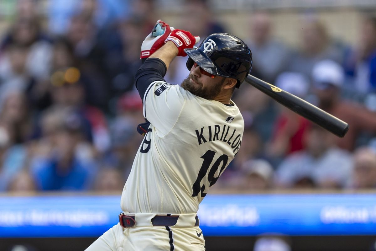 May 29, 2024; Minneapolis, Minnesota, USA; Minnesota Twins designated hitter Alex Kirilloff (19) hits a single in the against the Kansas City Royals in the first inning at Target Field. Mandatory Credit: Jesse Johnson-Imagn Images