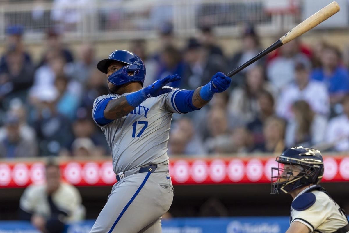 May 29, 2024; Minneapolis, Minnesota, USA; Kansas City Royals designated hitter Nelson Velazquez (17) hits a solo home run against the Minnesota Twins in the fifth inning at Target Field. Mandatory Credit: Jesse Johnson-USA TODAY Sports