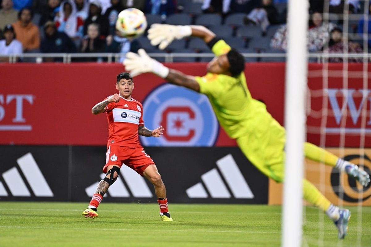 May 29, 2024; Chicago, Illinois, USA;  Chicago Fire FC midfielder Federico Navarro (31) attempts a shot on Orlando City SC goalkeeper Pedro Gallese (1) in the first half at Soldier Field. Mandatory Credit: Jamie Sabau-USA TODAY Sports